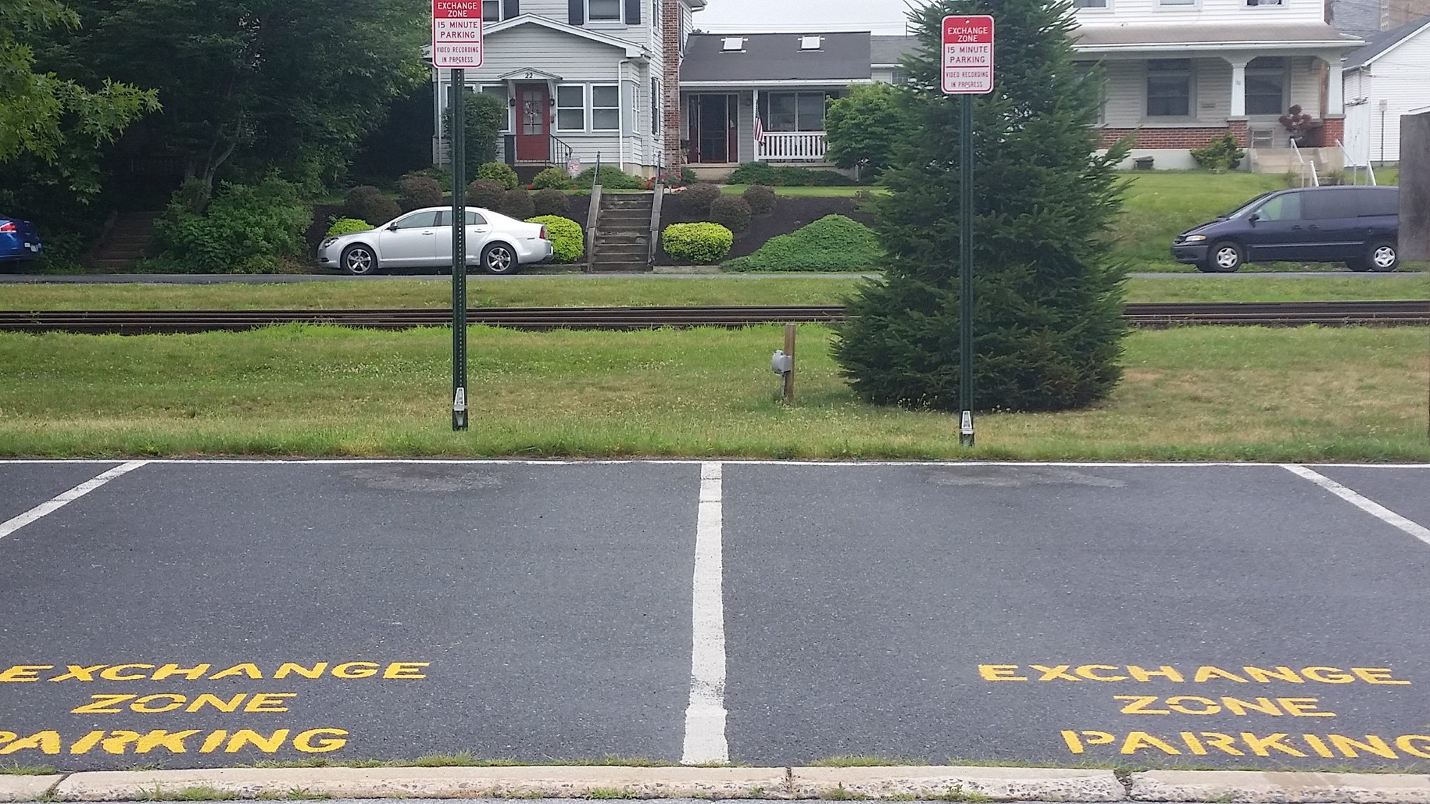 Two exchange zone parking spaces are located in the parking lot at 45 Railroad Street, Kutztown, PA 19530.